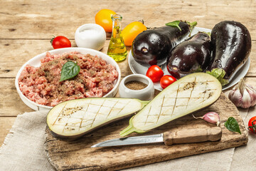 Stuffed eggplant ready to bake with ground meat, vegetables, and spices