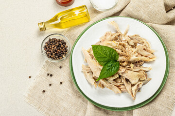 Boiled chicken meat with greens and spices. Low fat animal protein, healthy food lifestyle