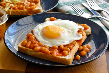 Egg and beans on toast.  English breakfast style.