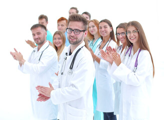 side view. a group of diverse doctors gives a standing ovation