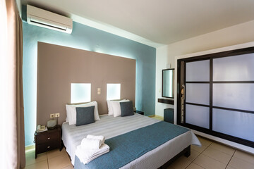 Bedroom interior. Comfortable bedroom with nice decoration. Modern bedroom in luxury apartment.