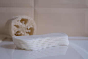 Female sanitary pads on the bathroom table. Feminine hygiene products