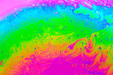 Abstract background with colorful rainbow gradient colors. Soap bubble close up psychedelic macro abstraction. Art design