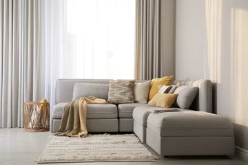 Foto op Plexiglas Living room interior with large grey sofa © New Africa