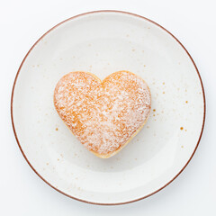 Doughnuts in the shape of a heart, heart-shaped cruller.