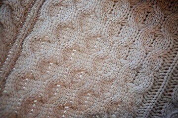 The texture of the knitted fabric of white threads