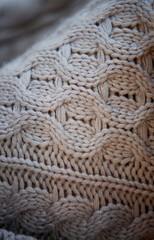 The texture of the knitted fabric of white threads