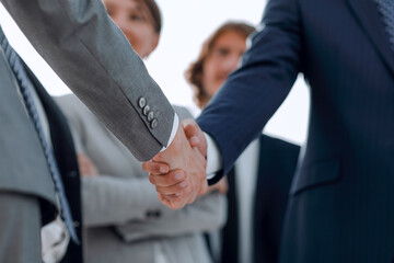 background image of handshake of business people .