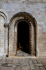 Fototapeta na wymiar Church side entrance. Historical center view of Noicattaro Metropolitan City of Bari, Italy