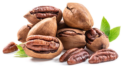 Shelled and cracked pecan nuts with leaves close-up on white background.
