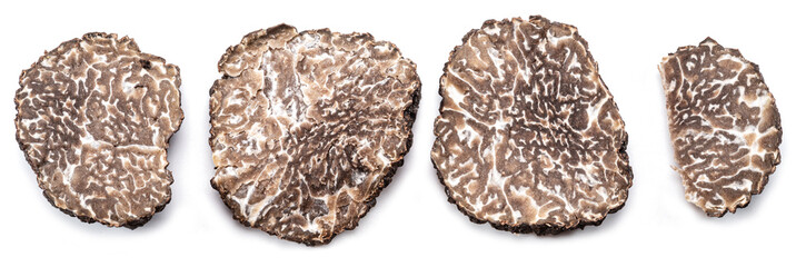 Black winter truffle slices on white background. The most famous of the trufflez.