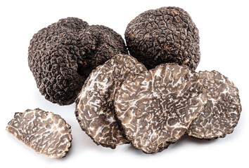 Black winter truffles and truffle slices on white background. The most famous of the trufflez.