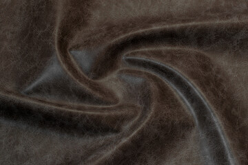 brown artificial leather with waves and folds on PVC base