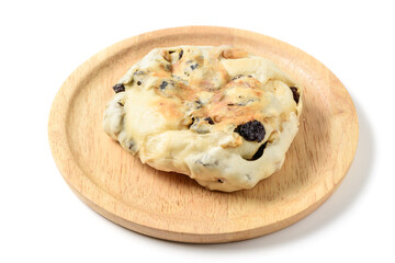 Walnut Raisin Bread Filled with Cream Cheese on wood plate isolated