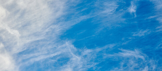 Cirrus clouds on blue sky, copy space, beautiful cirrus white clouds on blue day sky for background