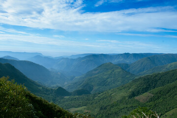 Mountain range valley with dramatic sky in morning landscape