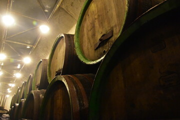 beer being brewed in an old oak barrel brewery