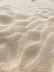 Fototapeta na wymiar 波模様の砂浜