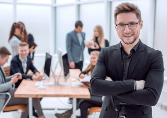close up. confident business man standing in the office