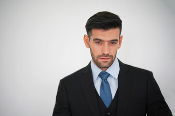 Elegant young Caucasian handsome man on White background, Studio fashion portrait.