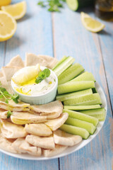 Tzatziki, Greek dip sauce with pita and cucumbers	