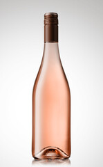 Bottle of rose wine, isolated on white background, with reflection.