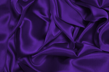 Purple silk or satin luxury fabric texture can use as abstract background.