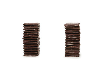 Dark chocolate candies isolated on white background.