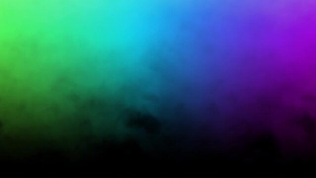 Abstract multicolored magical steam blown away by the wind. Colorful smoke moving on a black background. Slow motion cloudscape magic pattern. Seamless background, animation loop stock video.