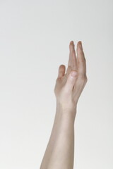 Side view of woman arms raised up ,empty hands together
