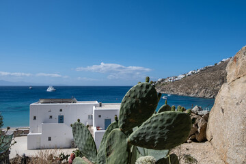 Mykonos island, Cyclades. Greece. Psarou cosmopolitan destination. View of ship moored in Aegean sea