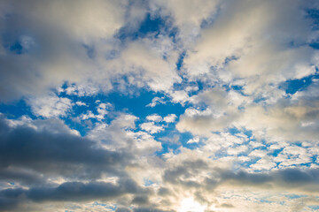Dark white clouds in a blue sky in bright sunlight in winter, Almere, Flevoland, The Netherlands, January, 2021