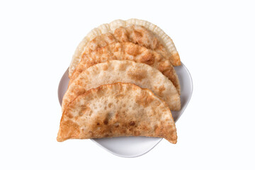 caucasian fried chebureks on a plate. On a white background