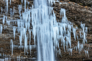 Beautiful Pericnik waterfall in Slovenia in wintertime