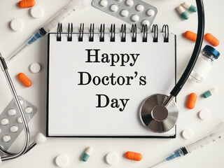 Happy Doctor's Day. Greeting Card. Close-up, view from above, nobody. Concept of preparation for a professional holidays. Congratulations for loved ones, relatives, friends and colleagues