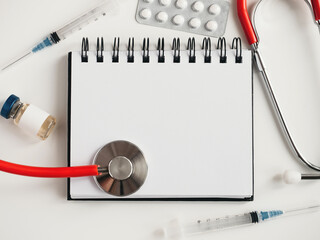 Blank page of notepad and place for your congratulatory inscription. Happy Doctor's Day. Closeup....