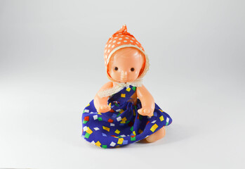 vintage baby doll.doll on a white background.
