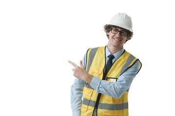 Happy engineer smiling while point his finger to copy space while looking at camera.