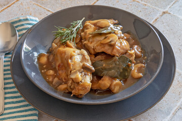 stewed rabbit with herbs and mushrooms