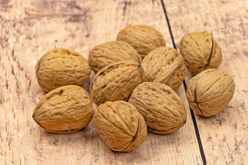 fresh walnut on wooden background