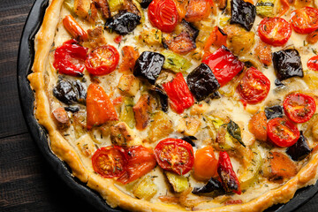 Close up of roasted vegetables and ricotta tart