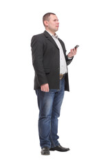 Young adult man talking on the phone standing over white background pointing with finger to the camera and to you, hand sign