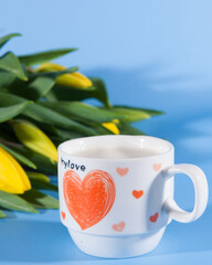Flowers and coffee. Romance on Valentine's Day