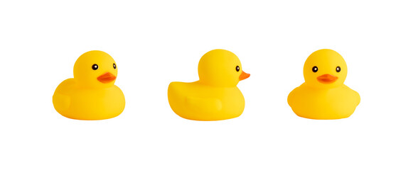 Three yellow rubber duck toys isolated on white background. - obrazy, fototapety, plakaty