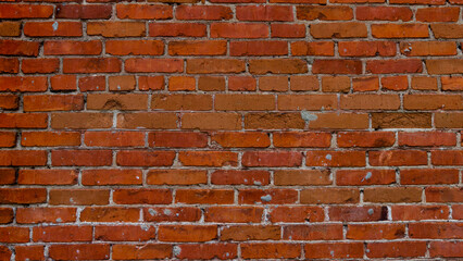The texture of a red brick shot in a general plan