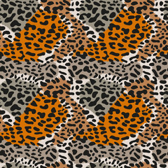 Leopard skin. Seamless pattern with leopard skin. Black spots on a background of brown and gray spots.