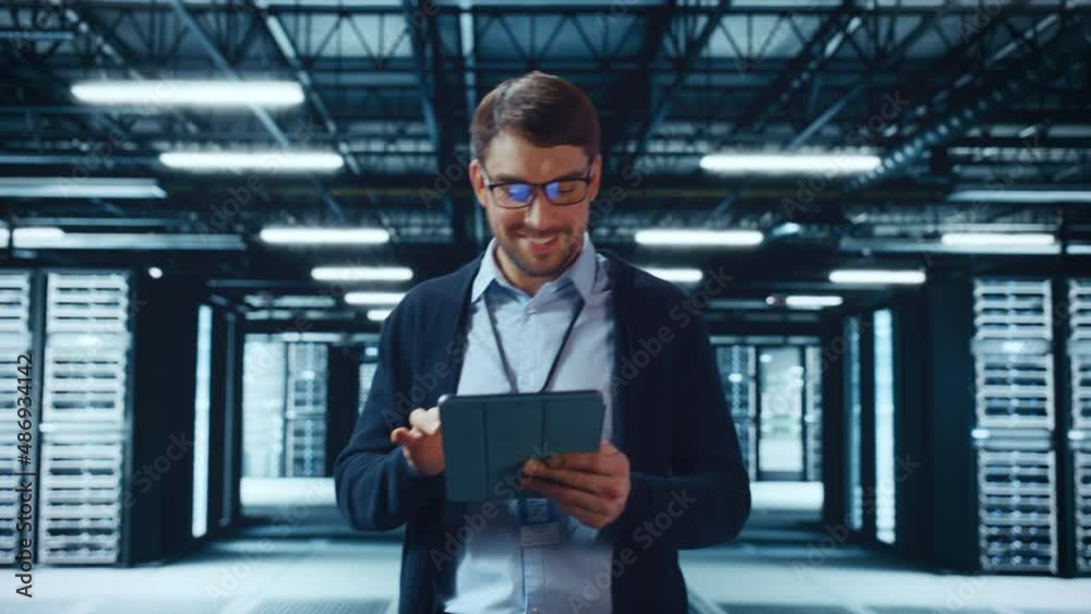 Poster Male IT Specialist Walks Between Row of Operational Server Racks in Data Center. Engineer Uses Tablet Computer for Maintenance. Concept for Cloud Computing, Artificial Intelligence, Cybersecurity.