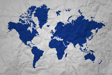 Blue World Map on crumpled paper background
