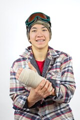 Snowboarder with broken wrist.