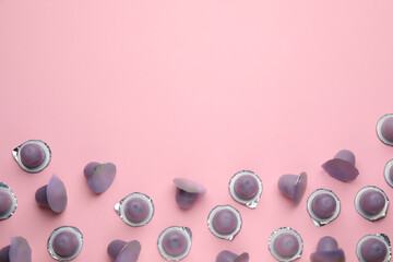 Tasty bright jelly cups on pink background, flat lay. Space for text